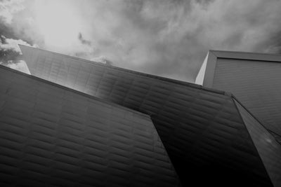 Sharp angled modern building with grey skies