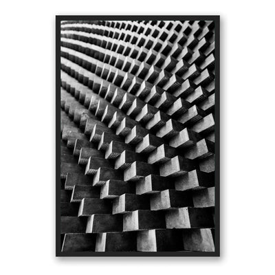 Black framed abstract photograph of brick wall