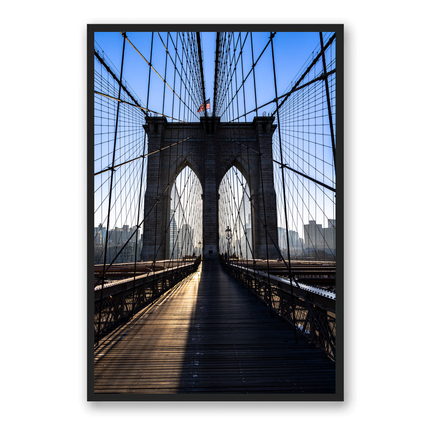 Black framed photograph of Brooklyn Bridge in New York City