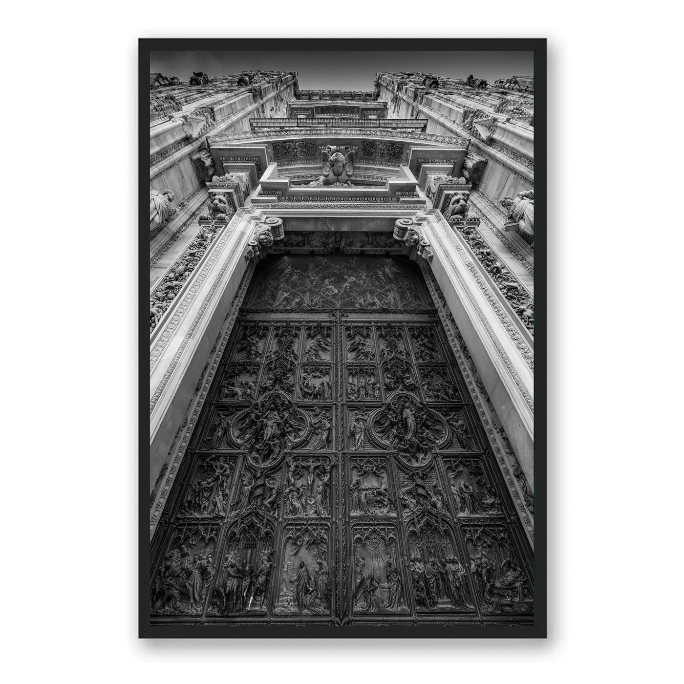 Black framed photo of ornate door