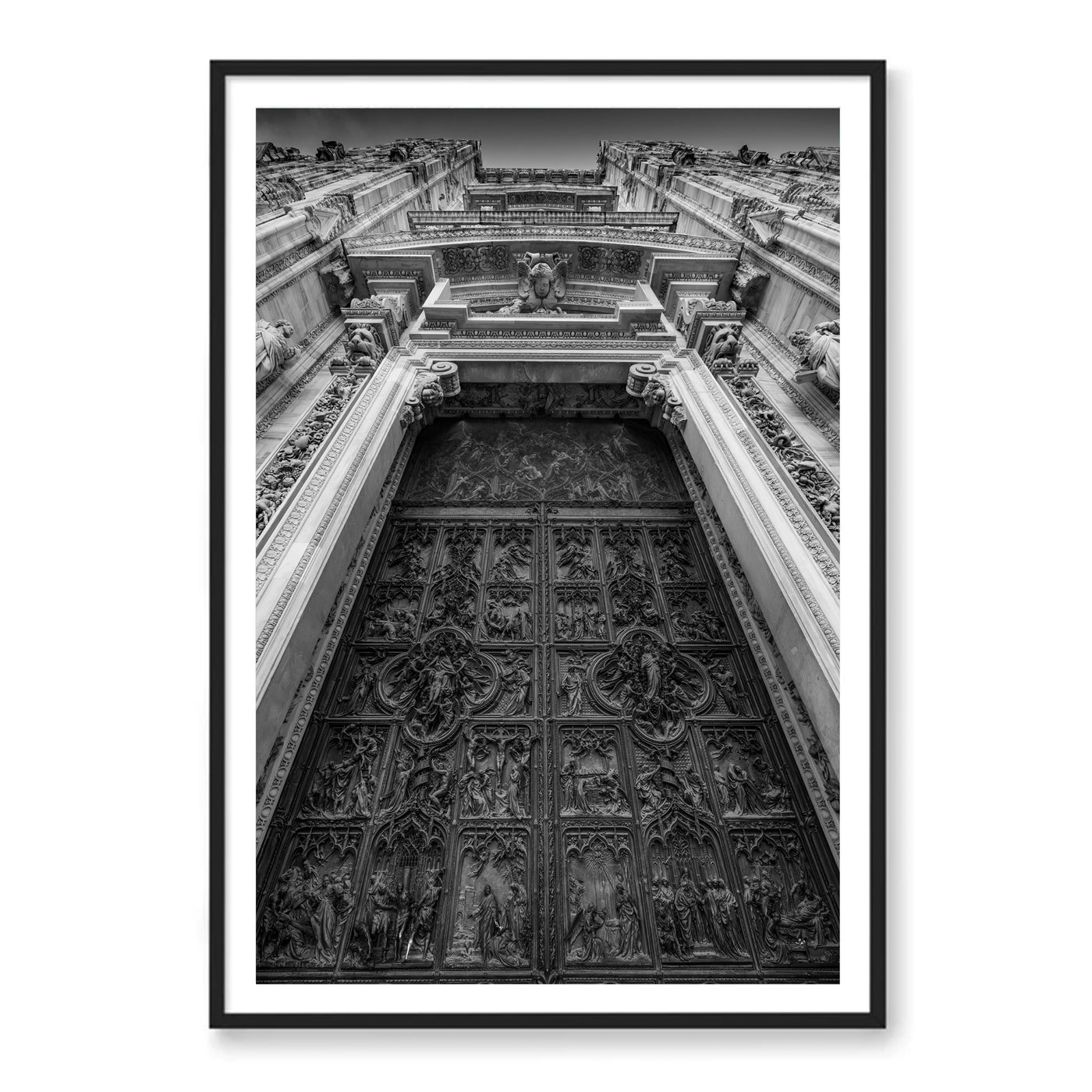 Black framed photo of ornate door