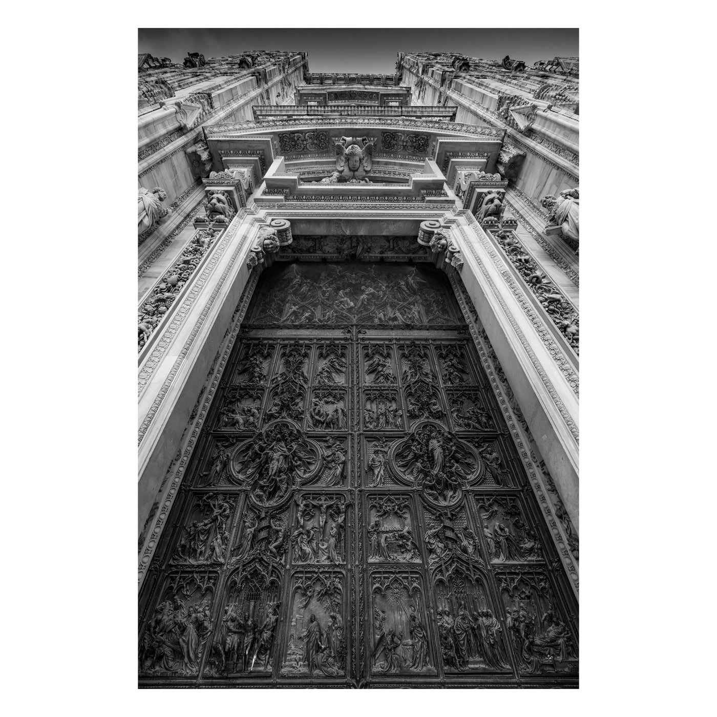 Black framed photo of ornate door