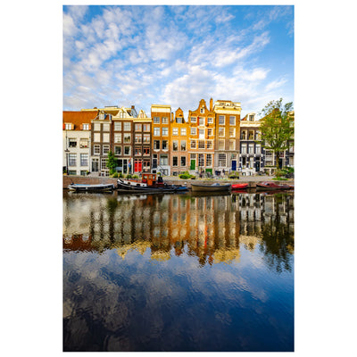 Amsterdam photograph with cloud and buildings reflecting on the water