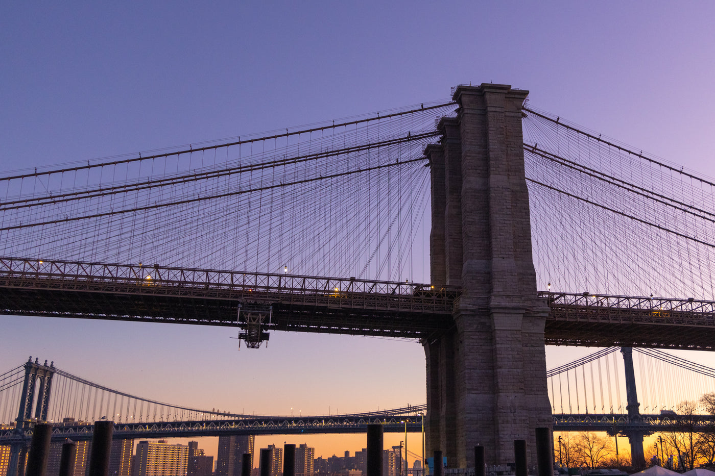 Brooklyn Bridge with purple sunrise